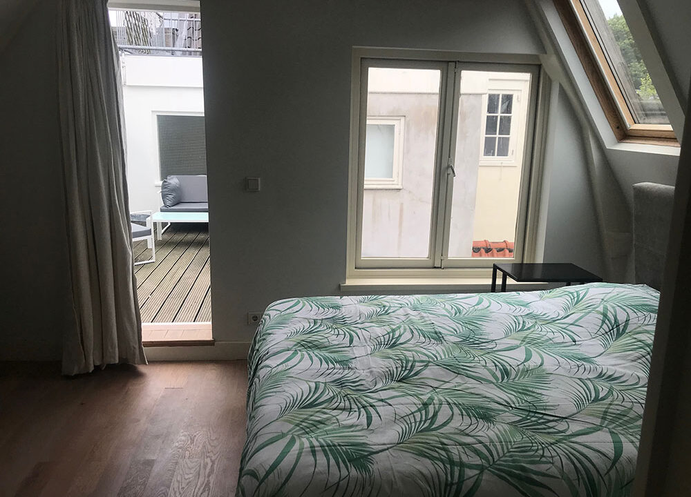 Herengracht apartments amsterdam bedroom to terrace app 2
